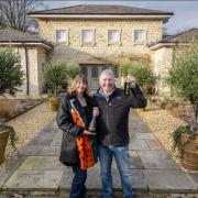 Amanda and Michael Maher celebrate winning their £3million home. Picture: SWNS