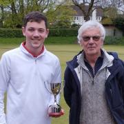 Jack Good (left) receiving the trophy from David Hunt (NDCC)