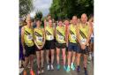 All smiles for Clevedon AC memebrs at Hogweed Trot 10k as they pose for the camera.