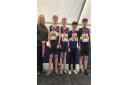 All smiles for North Somerset AC under-13s boys as they pose for the camera with their bronze medals.