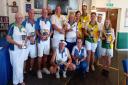 Winners and runners-up face the camera at the 13th Clevedon Bowls Tournament