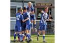Clevedon Town celebrate their dramatic victory against Wellington.