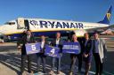 Ryanair staff announce the schedule from the tarmac.