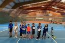 North Somerset Tennis Academy player Jesse, last person at the end, was the only player from Weston and North Somerset to take part in the Avon County under-eights tournament. Pic: North Somerset Tennis Academy.