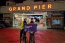 Jason P Belcher and Jason Smith in front of the Grand Pier after their 100 mile cycle around North Somerset Youth Cricket League clubs.