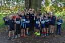 All smiles for North Somerset Athletics Club's under-11s as they pose for the camera at Blaise Castle Gwent cross-country event.