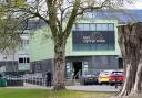 Police at Amman Valley school, in Ammanford, Carmarthenshire (PA)