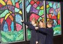High Down Junior pupils helped decorate the windows of High Street stores.