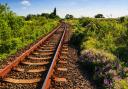 North Somerset's MP and council have both blasted 'red herrings' for slowing progress with plans to reinstate the Portishead and Pill railway lines.