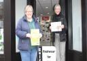 Tanya Marriott, left, and Sharon Flanagan from Portishead Easter Trail print sponsors Reeds Rains.