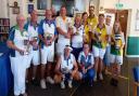 Winners and runners-up face the camera at the 13th Clevedon Bowls Tournament