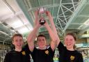 Clevedon Swimming Amateur Club members Dexter Jeal, Ben Godfrey, Holly Cole with the Cotswold A runners-up trophy.