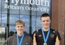 Clevedon Swimming Club 50m breaststroke Gold medallist and 1500m Bronze medallist Jamie Steadman with 200m backstroke silver medallist Sam Ledward.