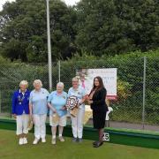 Hawthrons representative Aggie Janinski presents the shield and prizes to winning team Nailsea at the Ladies Open Triples Day