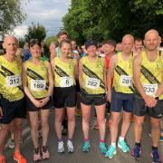 All smiles for Clevedon AC memebrs at Hogweed Trot 10k as they pose for the camera.