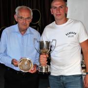 Pete Rideout presents the Supporters Player of the Year Award to Club Captain Callum Kingdon.