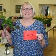 Linda Hodgetts with her prize bloom at this year's Spring Show.