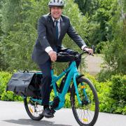 Metro mayor Dan Norris on an e-bike.