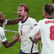 England’s Raheem Sterling, Harry Kane and Jordan Henderson celebrate winning the UEFA Euro 2020 semi final match at Wembley Stadium, London. Picture date: Wednesday July 7, 2021.