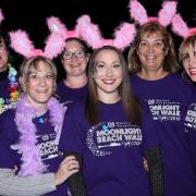 Fundraisers taking part in the Moonlight Beach Walk for Weston Hospicecare in 2019.