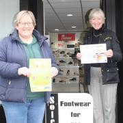 Tanya Marriott, left, and Sharon Flanagan from Portishead Easter Trail print sponsors Reeds Rains.