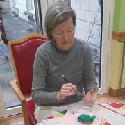 Residents have painted pebbles and decorated them with positive messages and thoughts with words such as wellness, happiness and kindness.