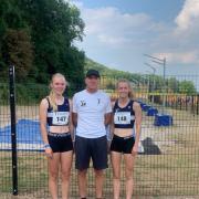 Keira and Ellie with North Somerset AC coach Julian Emery.