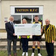 The cheque being presented to the club (L-R: Graham Goodhind, Carly Spear, Finn Skuse, Paul Griffin)