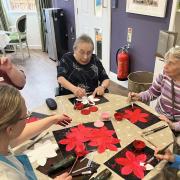 Cadbury Hall care home staff and residents created heart-shaped decorations, gifted each other and enjoyed an afternoon tea with the local community