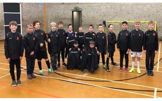 Clevedon United JFC - The Dragons - under-nines boys with their new rain jackets sponsored by Edwards.